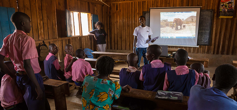 Students in Chumviere watching the Secret Life of Elephants
