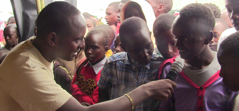 Jerenimo interviews school kids at the STE stand